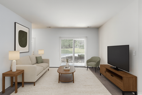 A living room with a couch, chair, and television.