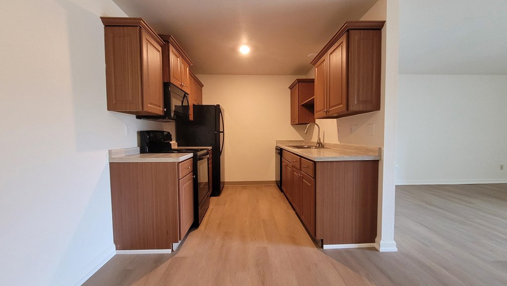 Kitchen at Whispering Pines Apartments in Holland, Michigan
