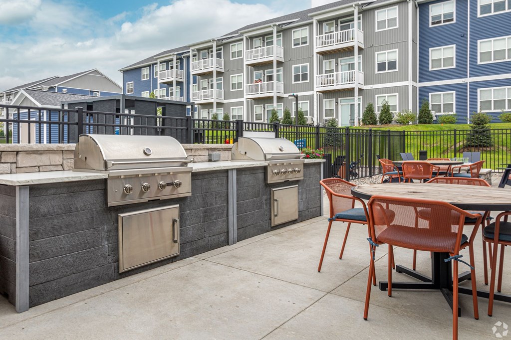 Pool, hot tub and pool deck at apartments in Traverse City | Bayview of Traverse City