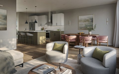 A modern living room with a grey sofa and a coffee table.