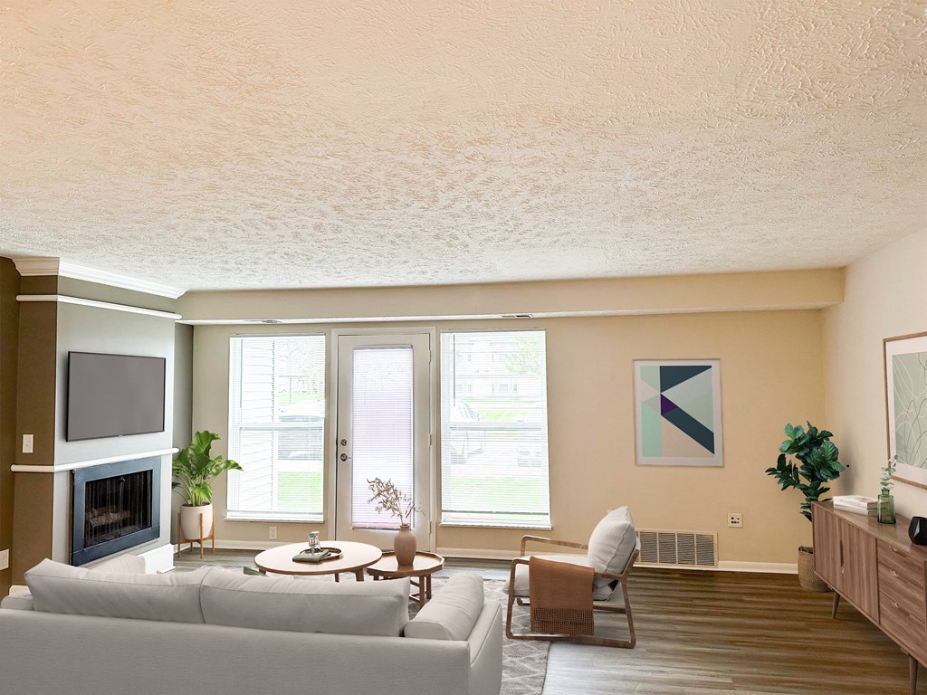 Renovated Open living room at Pine Lane Estates Apartments in Lansing, MI