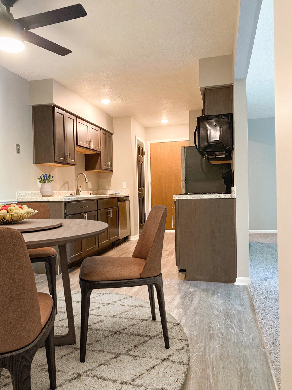 Kitchen and dining at Summerhill Estates Apartments in Lansing, MI