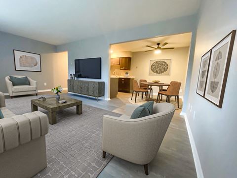 Spacious living room at Summerhill Estates Apartments in Lansing, MI