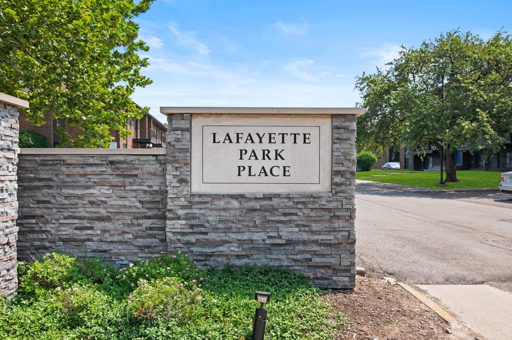 a stone wall with a sign that reads lafayette park at Lafayette Park Place, Detroit, MI, Detroit