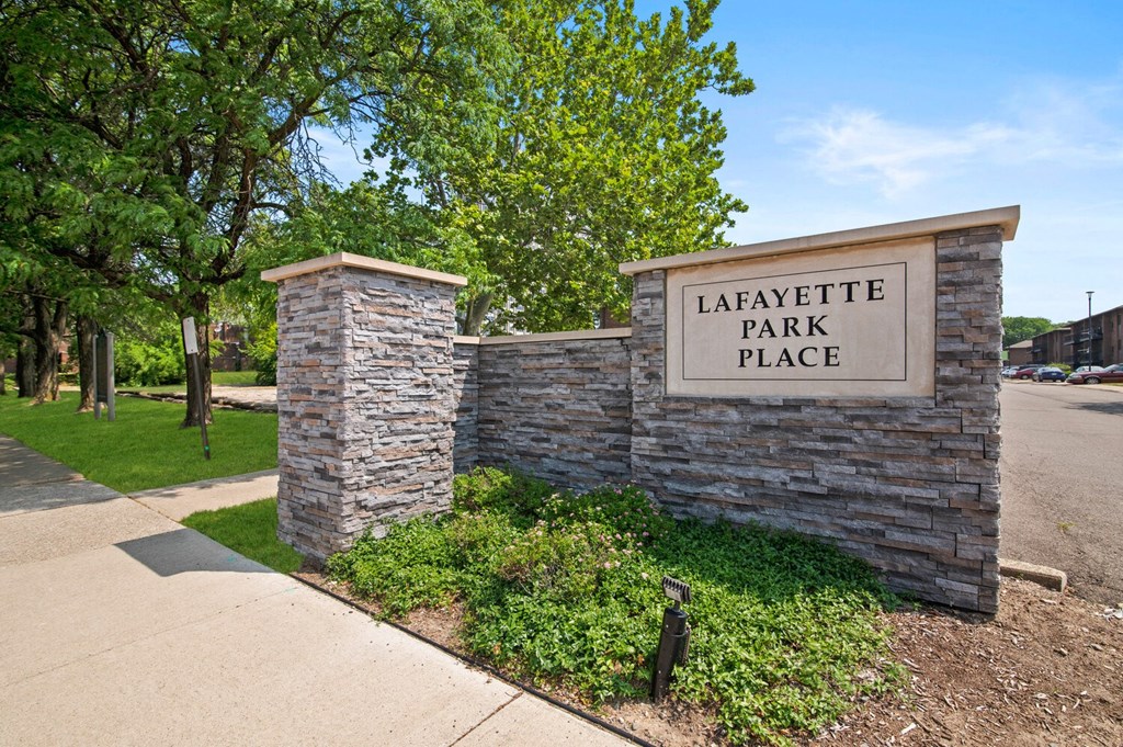 Stone wall with a Property Sign at Lafayette Park Place, Detroit, MI, Michigan, 48207