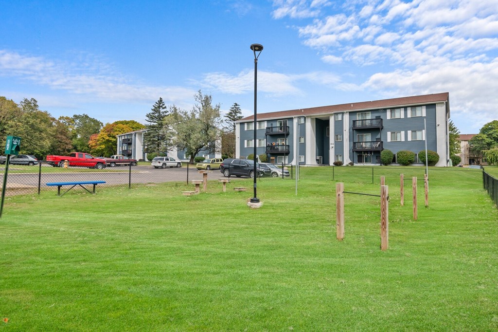 a building with a park in front of it