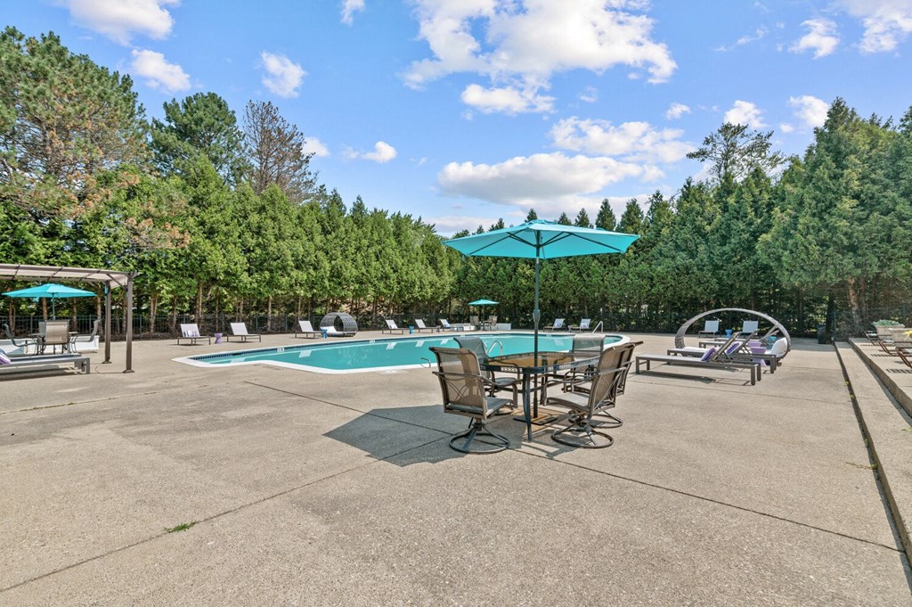 Poolside Relaxing Chair at Apple Ridge Apartments - Livonia, MI, Livonia, Michigan