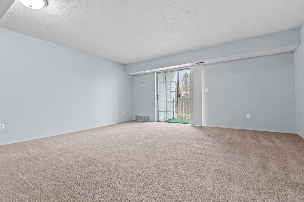 Unfurnished Living Area at Fairfax Apartments - Lansing, MI, Lansing, 48917