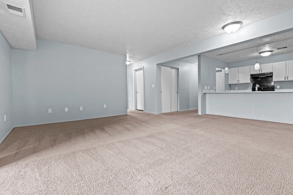 Living And Kitchen at Fairfax Apartments - Lansing, MI, Michigan