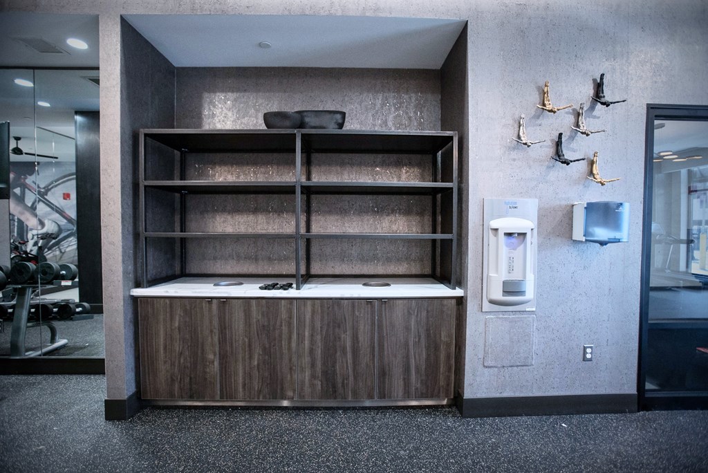 a bathroom with a shelf and a sink in it