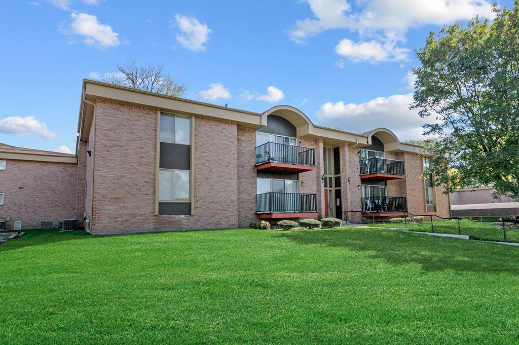 our apartments at the district feature a spacious yard and green grass