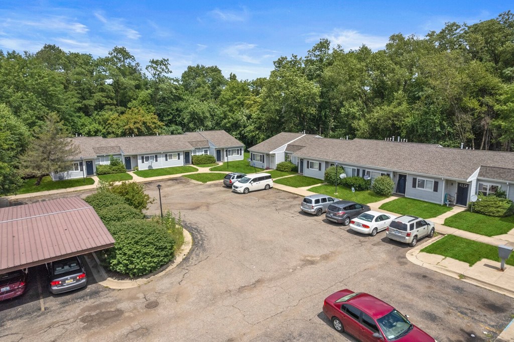Top view of parking at Parchment Point Townhomes & Apartments - Parchment, MI, Parchment