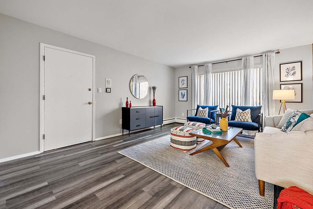 spacious living room with couch and coffee table at the adelaide apartments