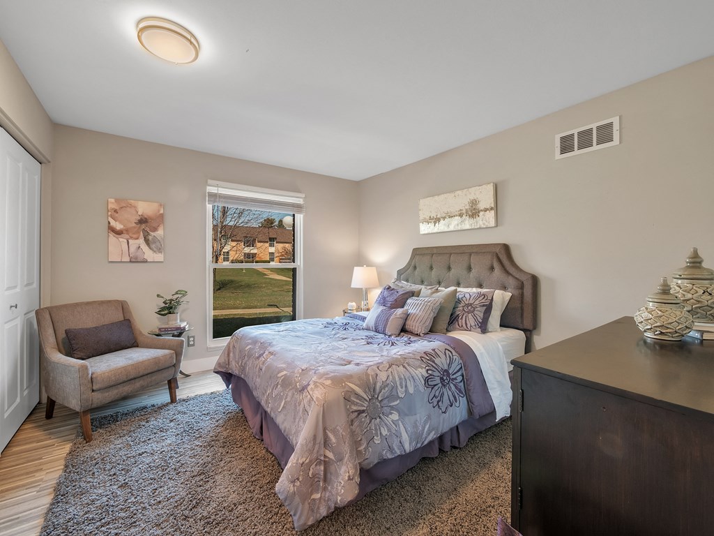 Spacious Bedroom With Comfortable Bed at Rochester Club Apartments - Rochester, MI, Michigan