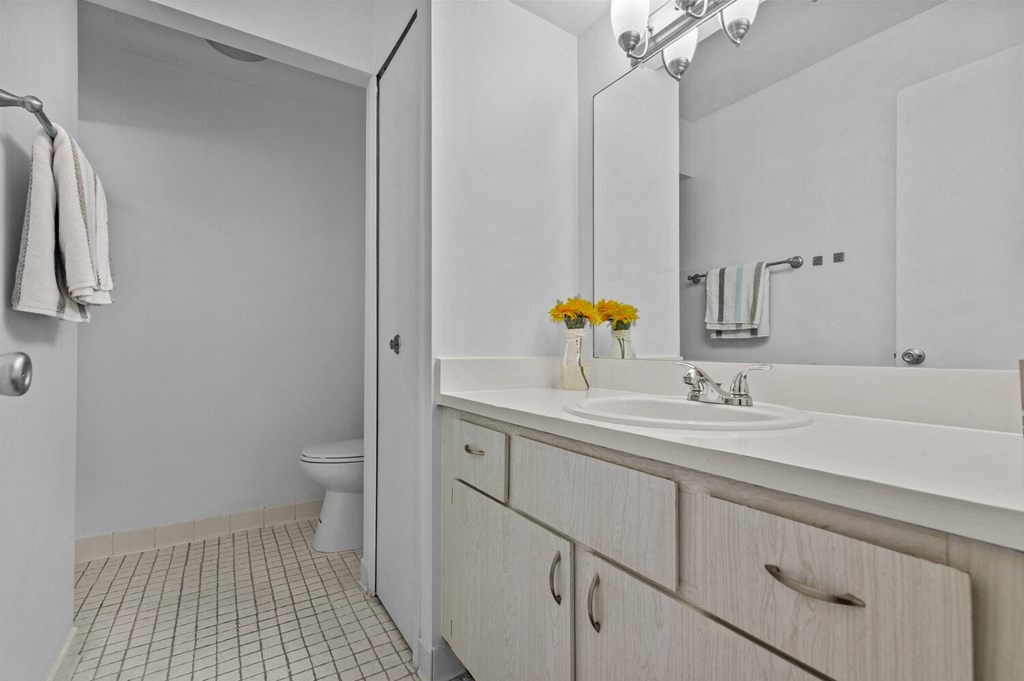 a bathroom with a sink and a shower and a toilet at Edge At Farmington Hills - Farmington Hills, MI, Michigan, 48334