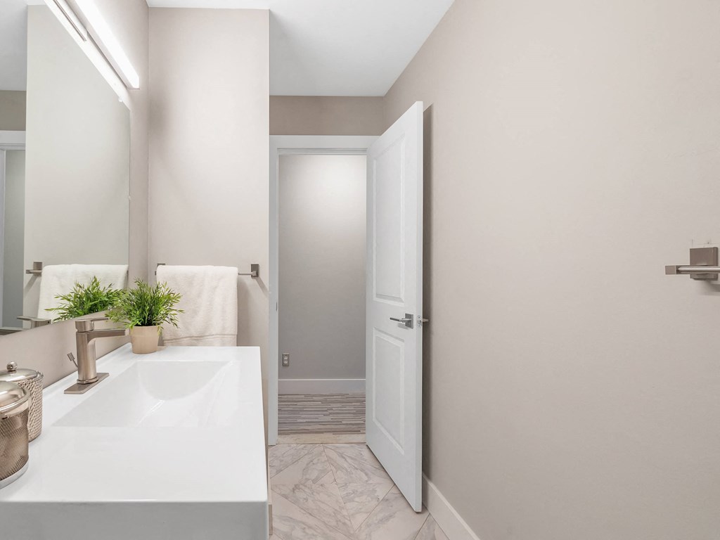 Renovated Bathrooms With Quartz Counters at Rochester Club Apartments - Rochester, MI, Rochester Hills