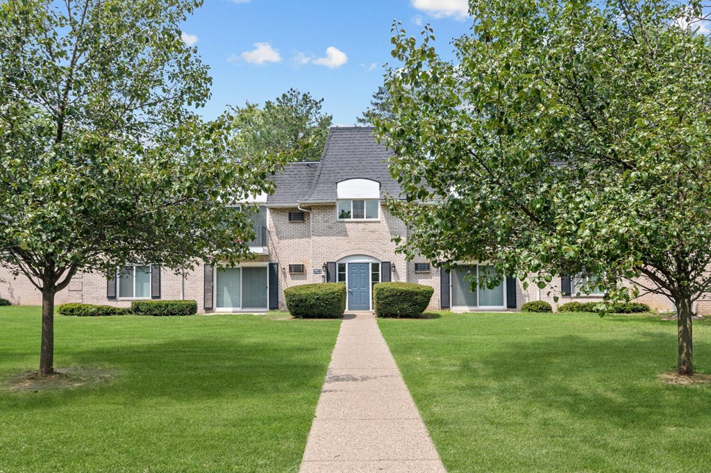 Long walkway leading to the front door at Apple Ridge Apartments - Livonia, MI, Michigan, 48152