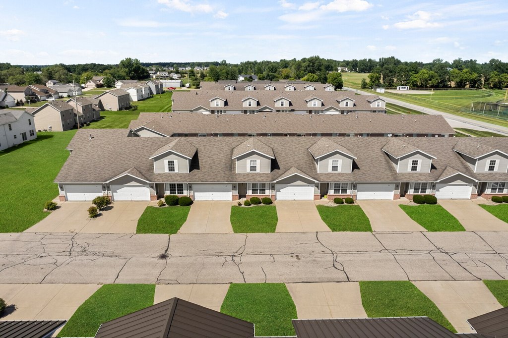 an aerial view of a group of houses in a neighborhood