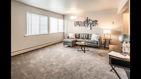 a living room with a couch and a table