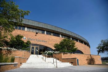 A building with a Main Entrance sign on it.