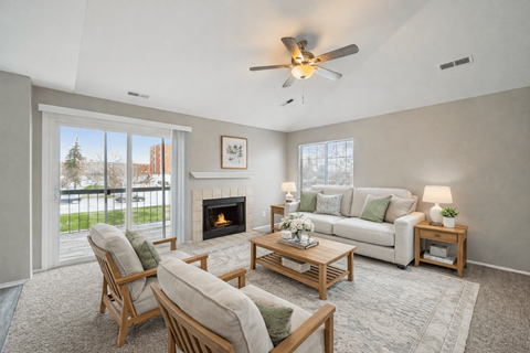 Southfield living room with a fireplace and a couch.