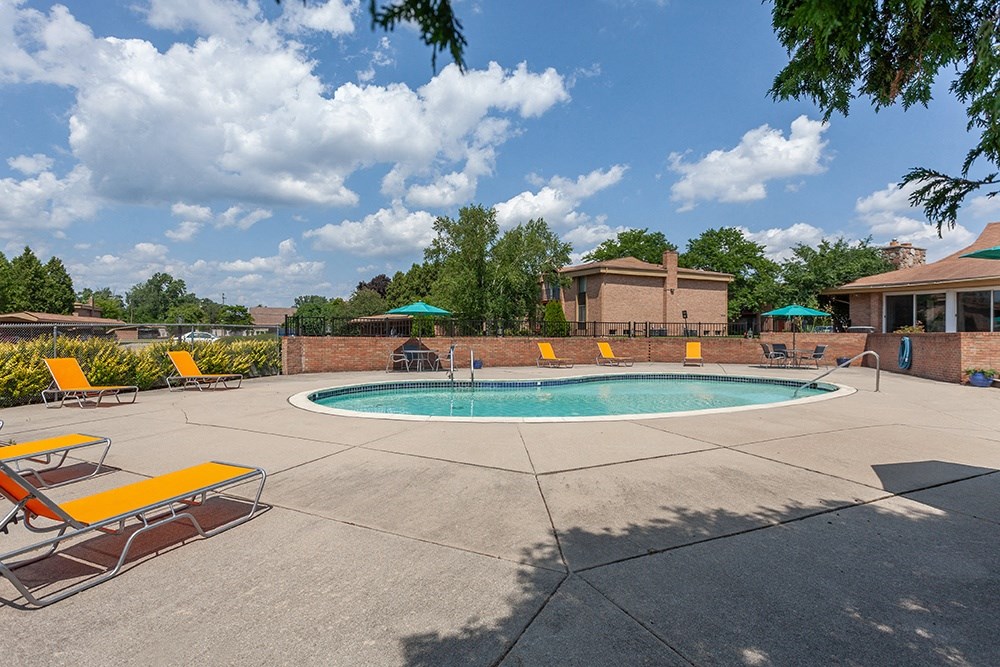 our apartments have a large pool and lounge chairs