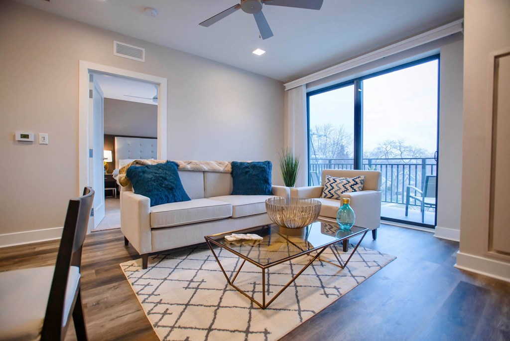 a living room with a couch and a table