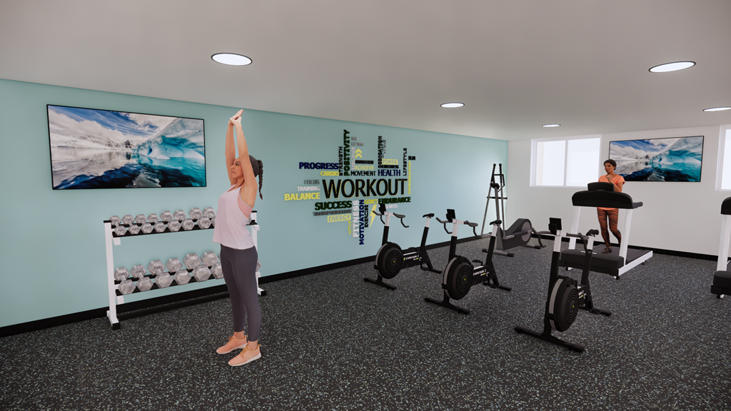 A woman is stretching in a gym with a wall of equipment behind her.