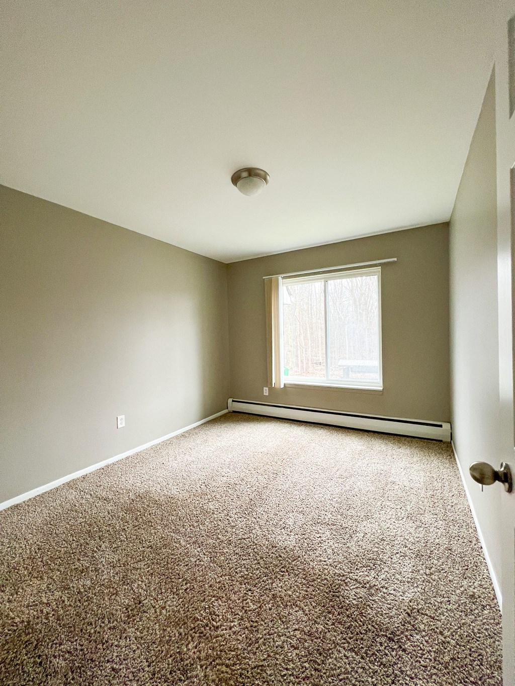 an empty room with a window