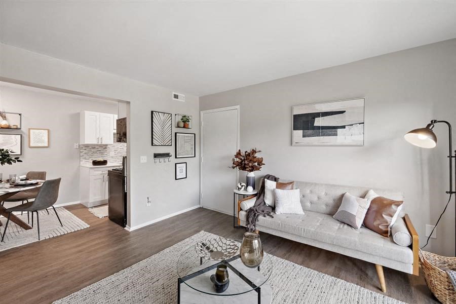 a living room with a couch and a table