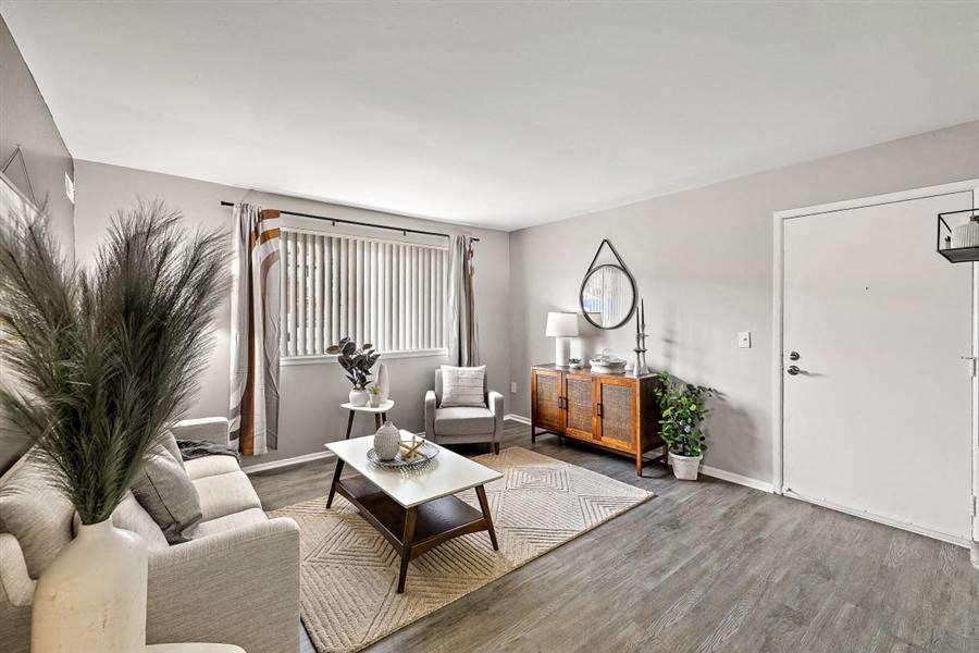 a living room with a couch and a table