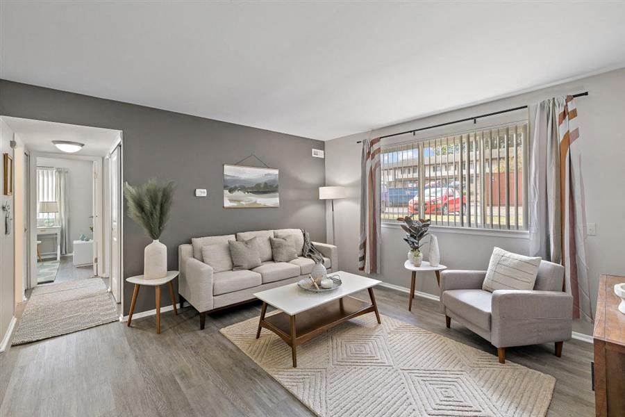 a living room with a couch and a table