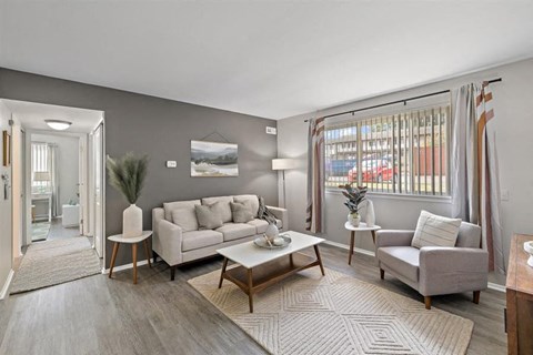 a living room with a couch and a table