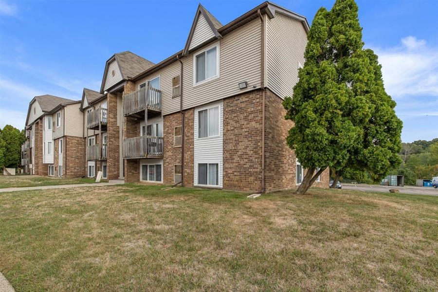 our apartments are located in a quiet area with a tree