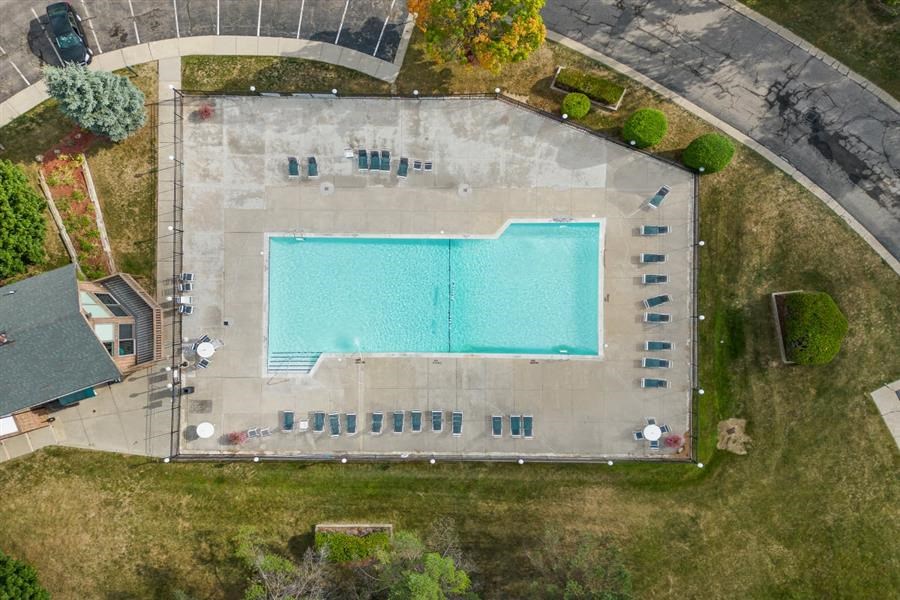 an overhead view of a swimming pool on a roof