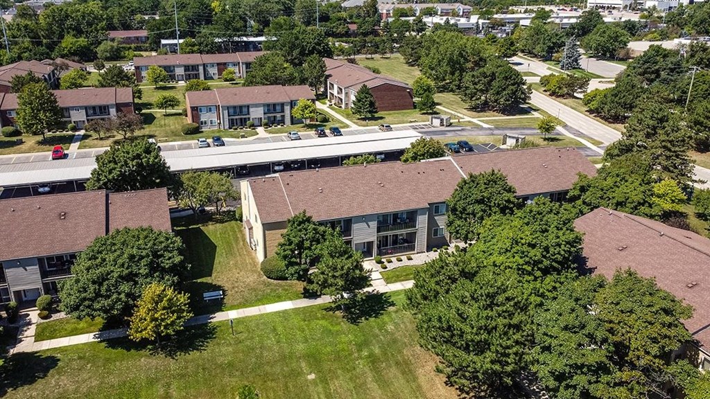 an aerial view of a neighborhood with houses and trees at Sunnymede Apartments - Troy, MI, Troy