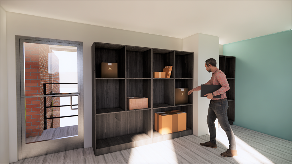 A man is carrying a box into a room with a large shelf.