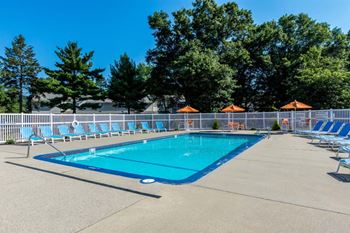 Beautifully designed outdoor swimming pool with pool deck
