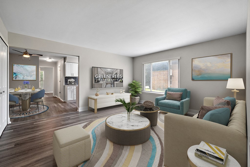 A living room with a sofa, armchairs, and a coffee table.