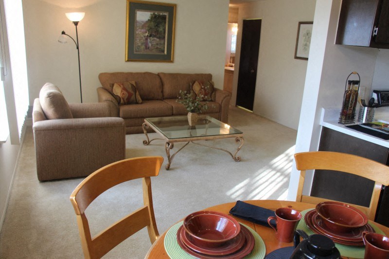 a view of the living room from the dining area