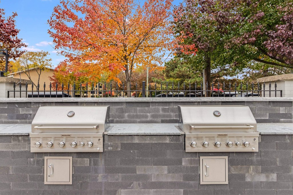 Two grills are built into a wall at The Waverly on the Lake - Belleville, MI Apartment , Belleville, MI