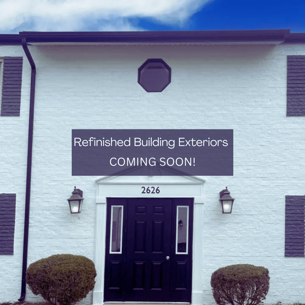 the front of a building with a sign on it