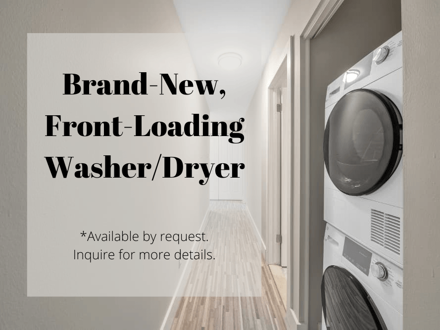 a brand new front loading washer dryer in a laundry room at Apple Ridge Apartments - Livonia, MI, Michigan, 48152