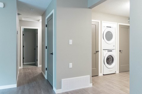 A laundry room with a washer and dryer.