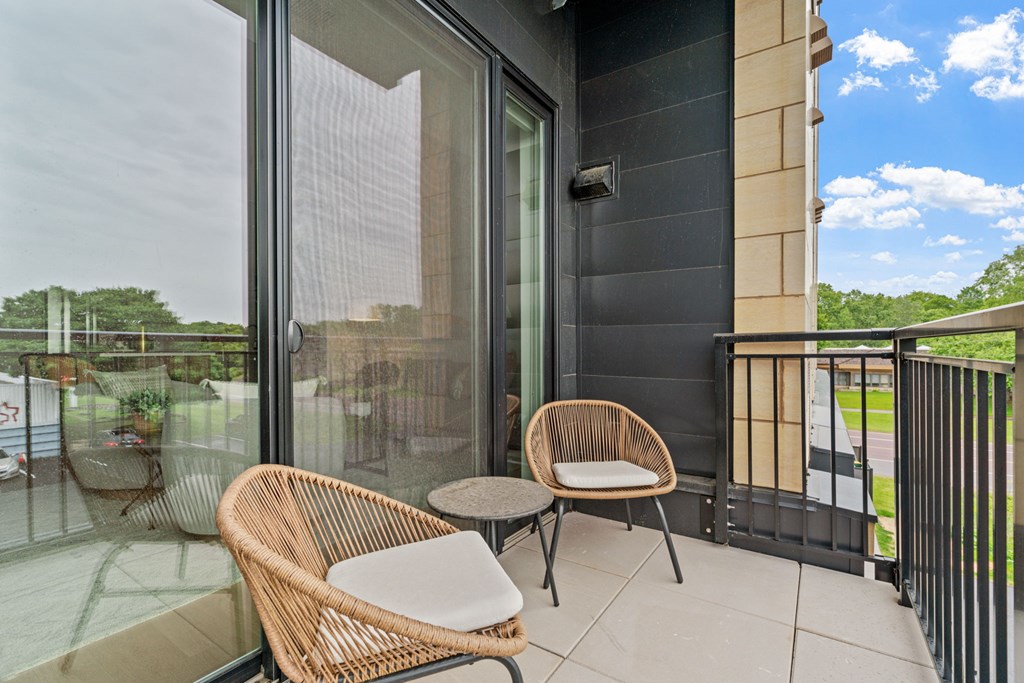 Outdoor private balcony in a one-bedroom, one-bathroom apartment home at Lilia in Lilydale, MN 55118