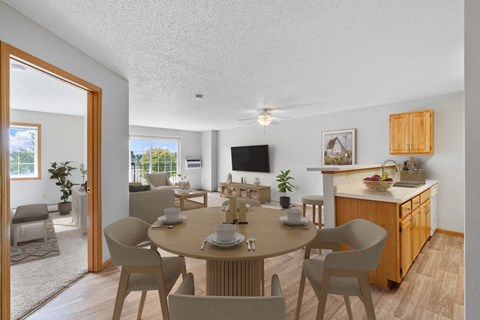 Kitchen, dining, and living room at The Preserve at Commerce, Rogers, MN, 55374