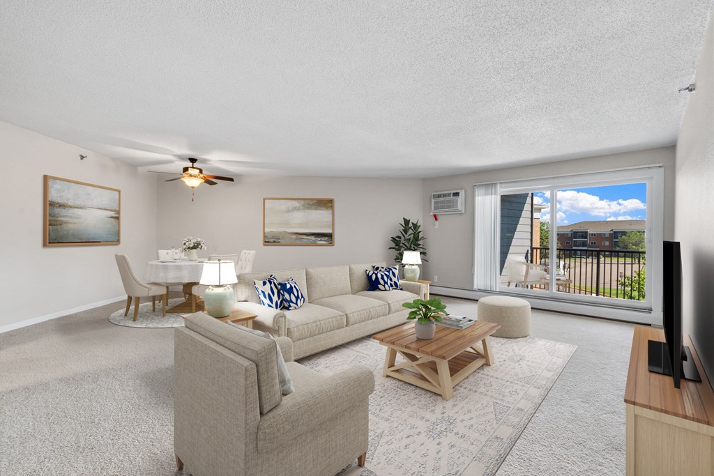 Living room and dining room at Cedars Lakeside, Little Canada 55117