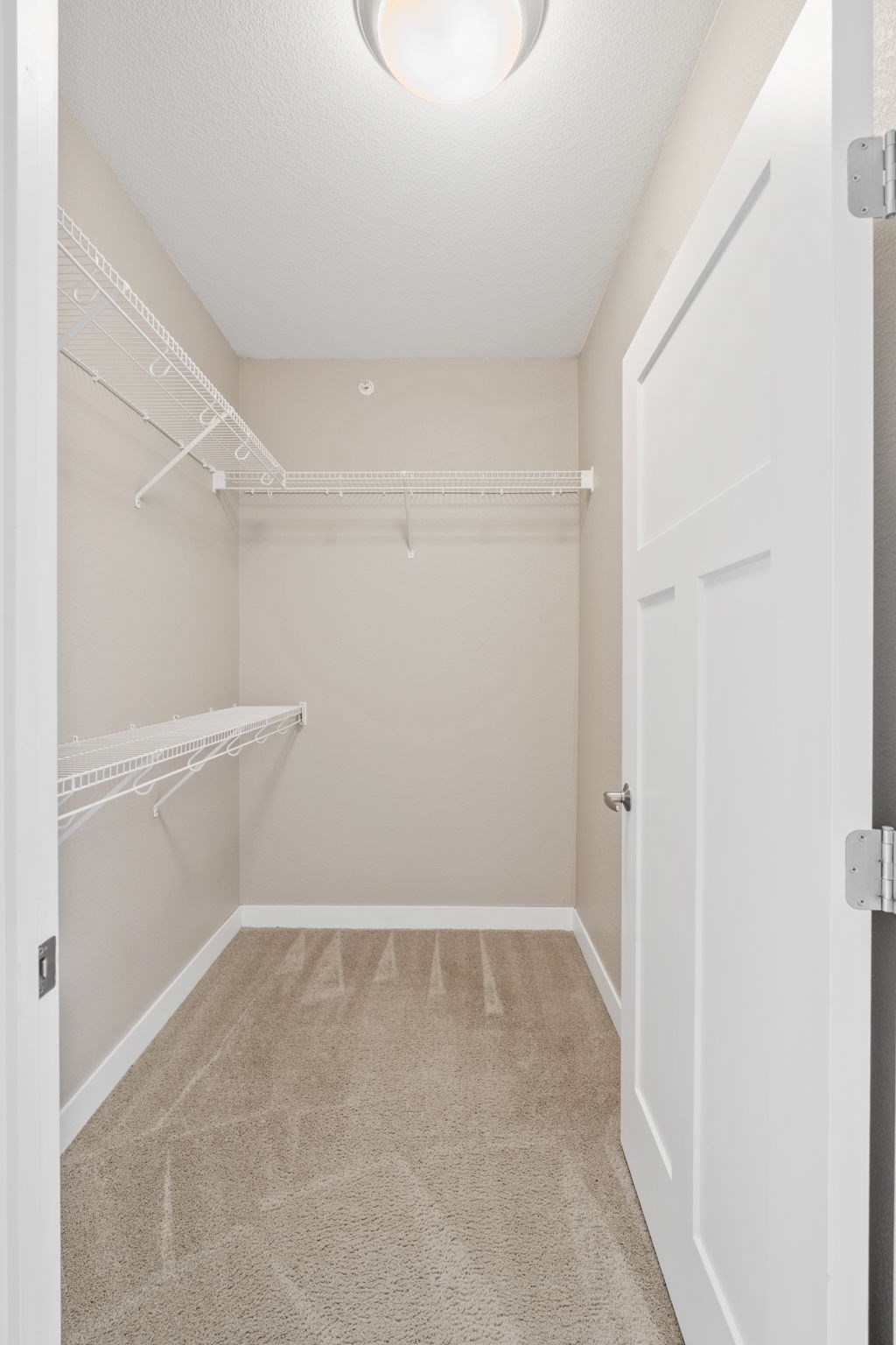 Walk-in closet of the Modern Collection at Evans Meadows Apartments in Elk River, MN 55330