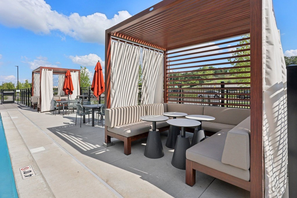 Cabanas on the pooldeck and outdoor pool and spa at The Mera in St. Louis Park, 55426