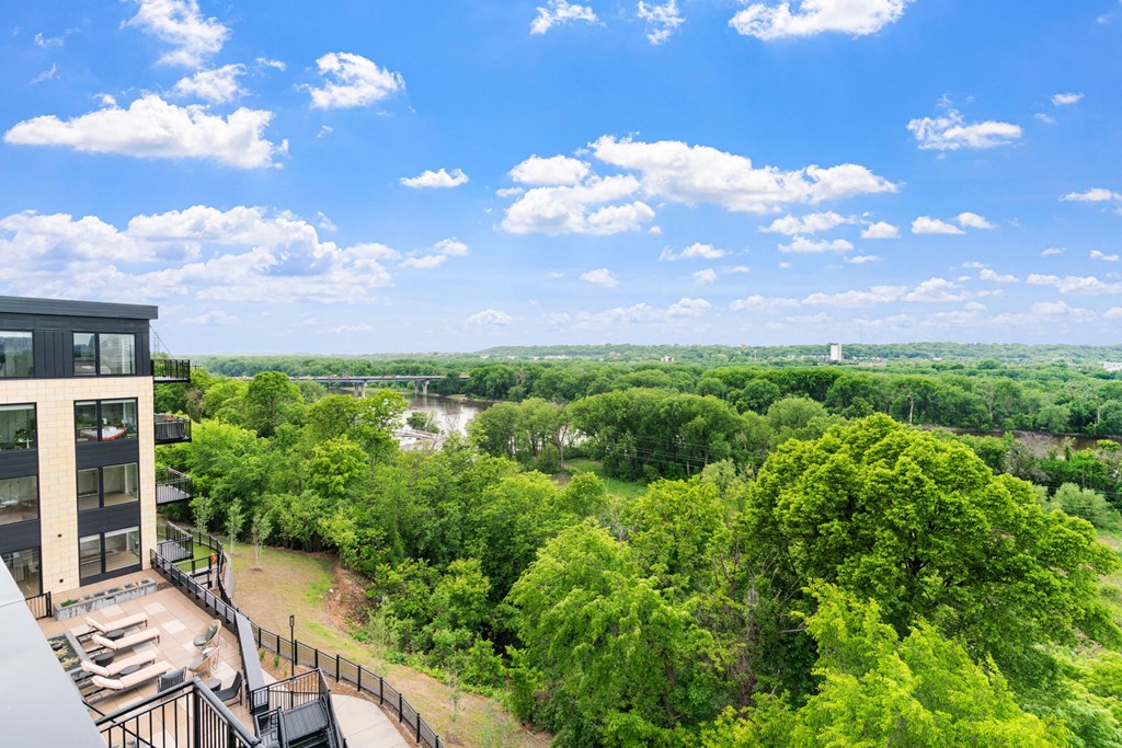 The view of the Mississippi River from the top floor terrace with seating and fire pits leading from the Parlour and the Tea Room at Lilia in Lilydale, 55118